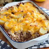 Layers of beef, potatoes, and cheddar cheese baked together into a golden meal.