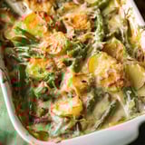 Golden potatoes and green beans baked in creamy cheese.